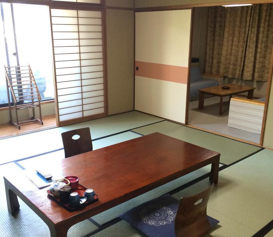 Imakuni Ryokan Takachiho Zimmer foto