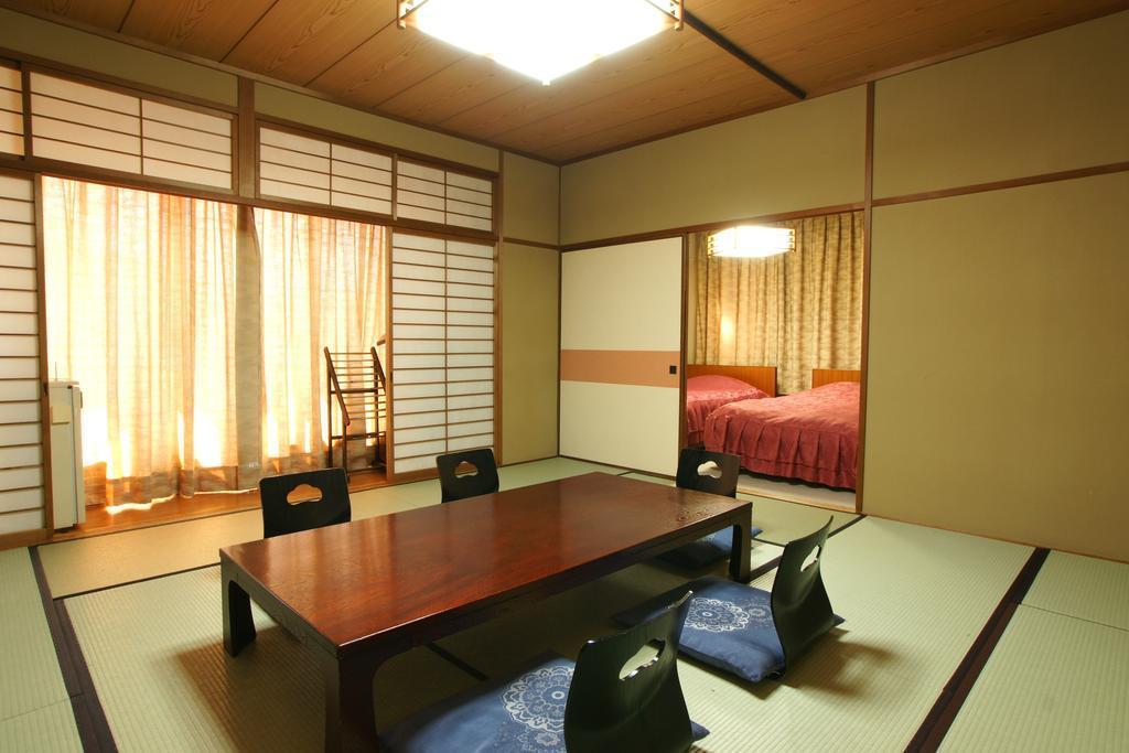 Imakuni Ryokan Takachiho Zimmer foto