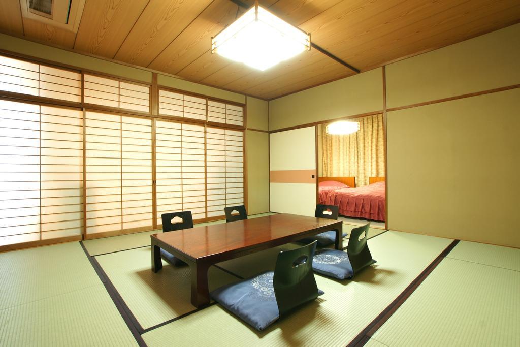 Imakuni Ryokan Takachiho Zimmer foto